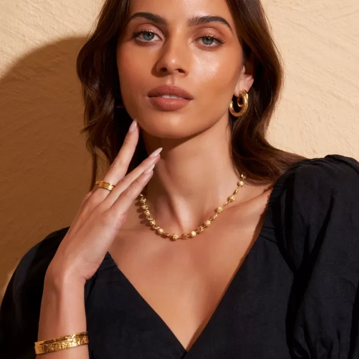 olivia_gold_cuff_bracelet_5-1.webp Shop Arms of Eve Olivia Gold Cuff Bracelet